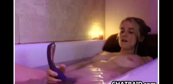 Mature chick masturbates in the tub